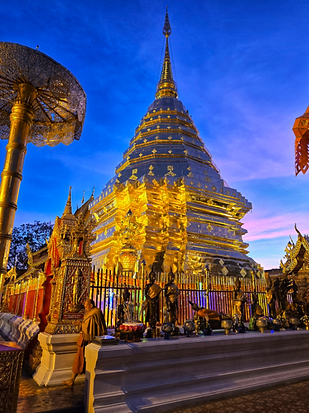 Golden temple in Thailand at dusk