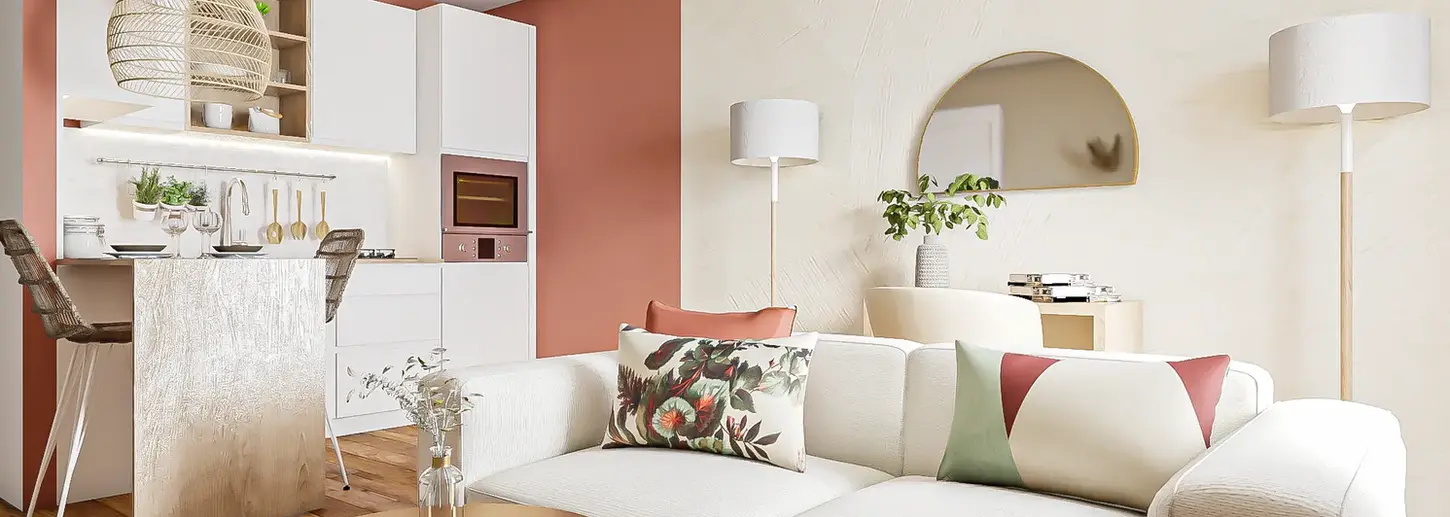 Un petit salon contemporain dans les tons clairs, blanc et terracotta. Une cuisine ouverte donne sur le petit saon bien aménagé avec des matières naturelles.