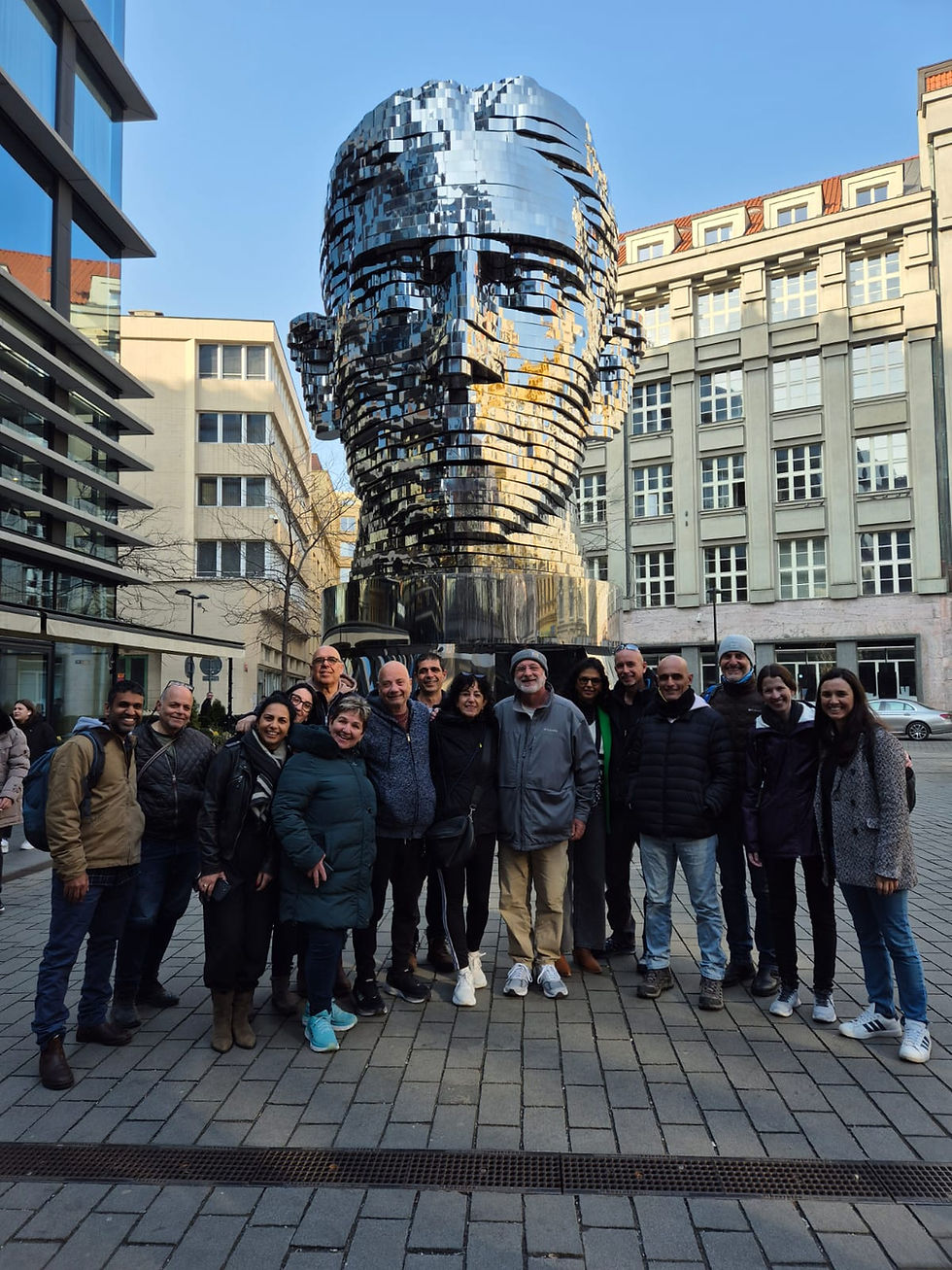 Rehabilitation program group visiting Franz Kafka's rotating Head