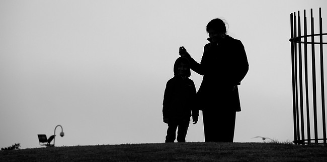 Silhouette of mother and child