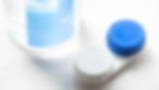 A case and solution for cleaning reusable contact lenses.