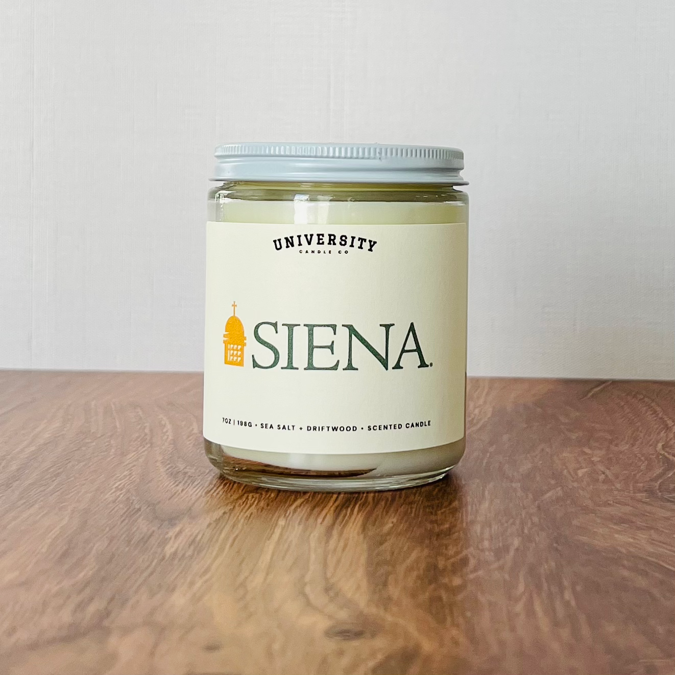 University Candle Co. Siena candle, oakmoss, sea salt, driftwood, mountain springs.