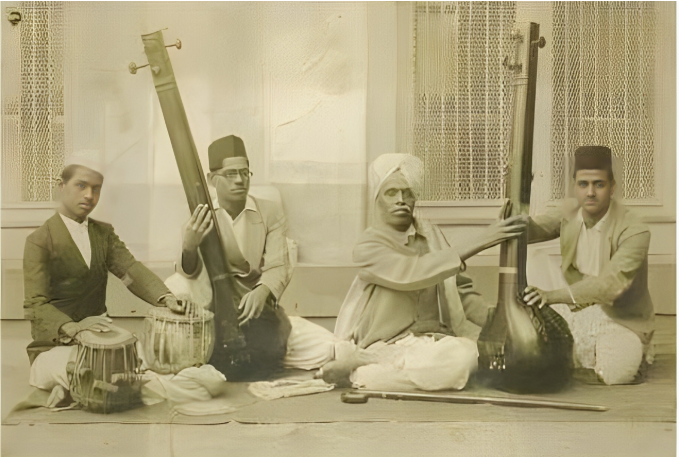 Pandit Antubuwa tuning his tanpuras before his performance