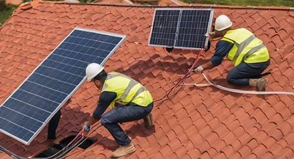 people fitting solar panels on the roof of red tiles house.jpg