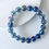Thumbnail: Stringed bracelet with stunning aura quartz