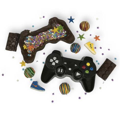 Joystick de chocolate relleno de bombones, mini tabletas y grageas