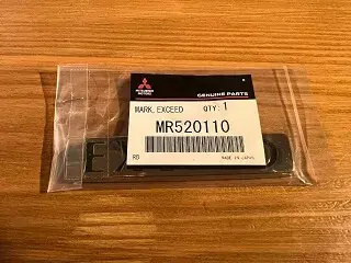 Genuine Mitsubishi Pajero MR520110 - MARK,EXCEED