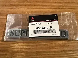 Genuine Mitsubishi Pajero MN146115 - MARK,SUPER EXCEED