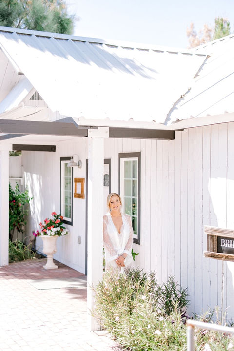 Bride makes her grand entrance from the bridal suite at Windmill Winery