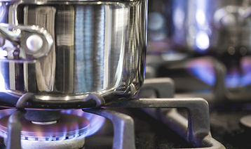 Olla en mechero de gas