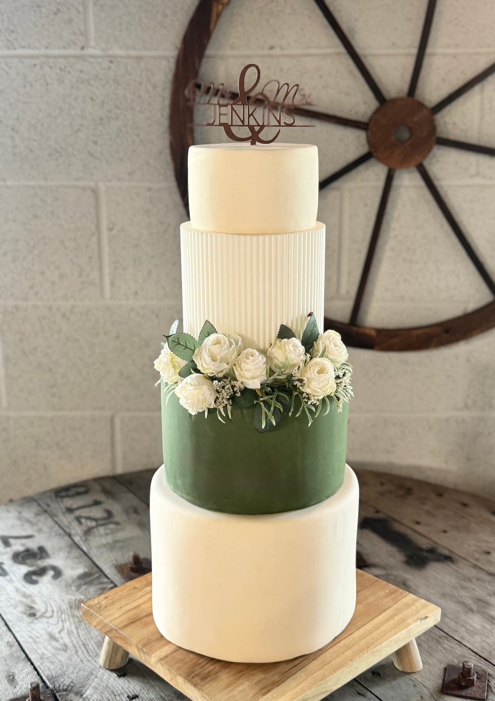 4 Tier wedding cake green theme with roses