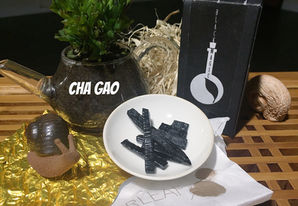 Eating Black Magic Cha Gao (Tea Paste)