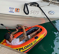Owner of Below the Belt gets down and dirty with his buffer on a floating raft