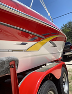 Red and white boat just after detail completed.