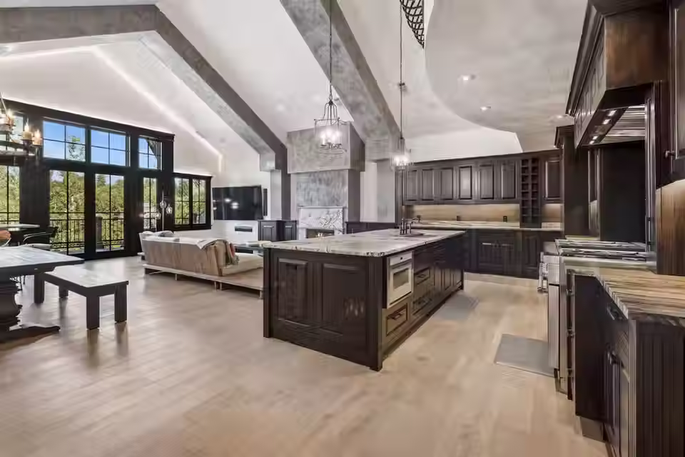 Modern kitchen remodel in Fort Lauderdale featuring hardwood floors and custom cabinets