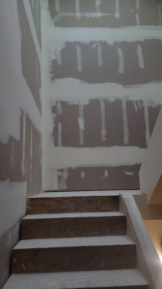 drywall finishing Miami staircase walls level 5 smooth