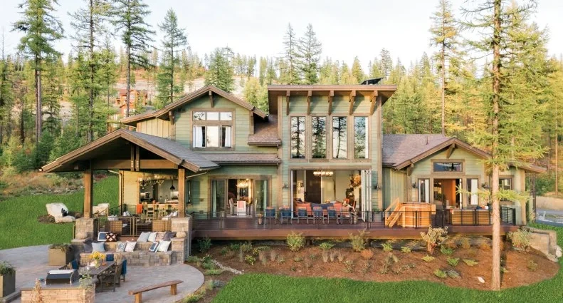 Outdoor log home refinished by wood contractor near me.