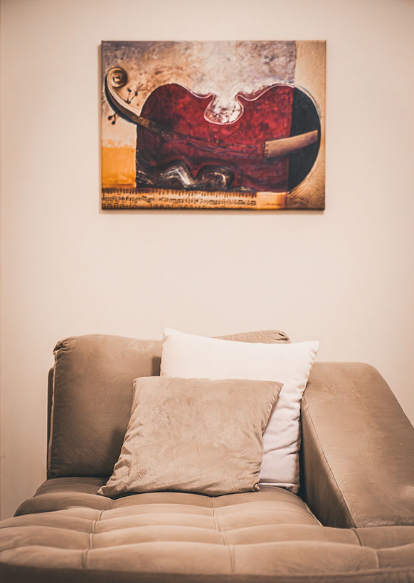 painting and couch in psychologist's office
