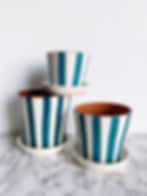 planters in teal