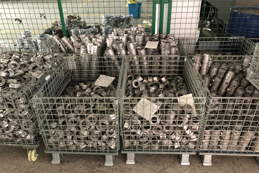 Stainless steel ball valve components and assembly line in an industrial valve factory