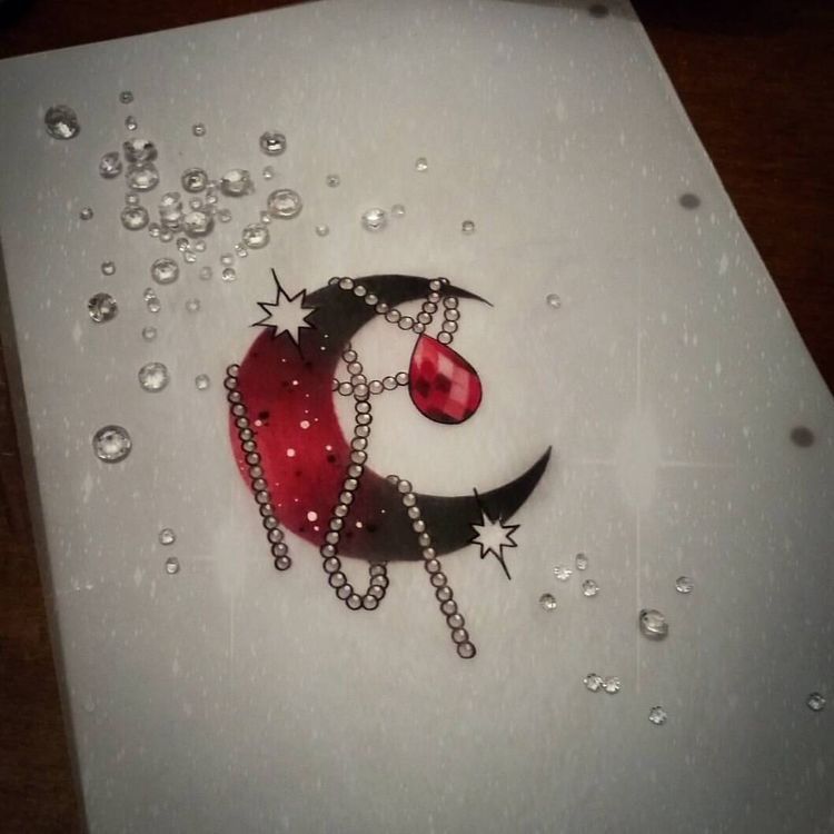 moon tattoo with feminine girly beads and sparkling diamond crystal in black and red colors