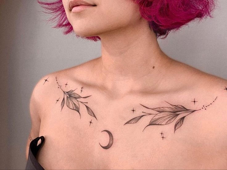 moon and vines chest tattoo for a woman under collarbone