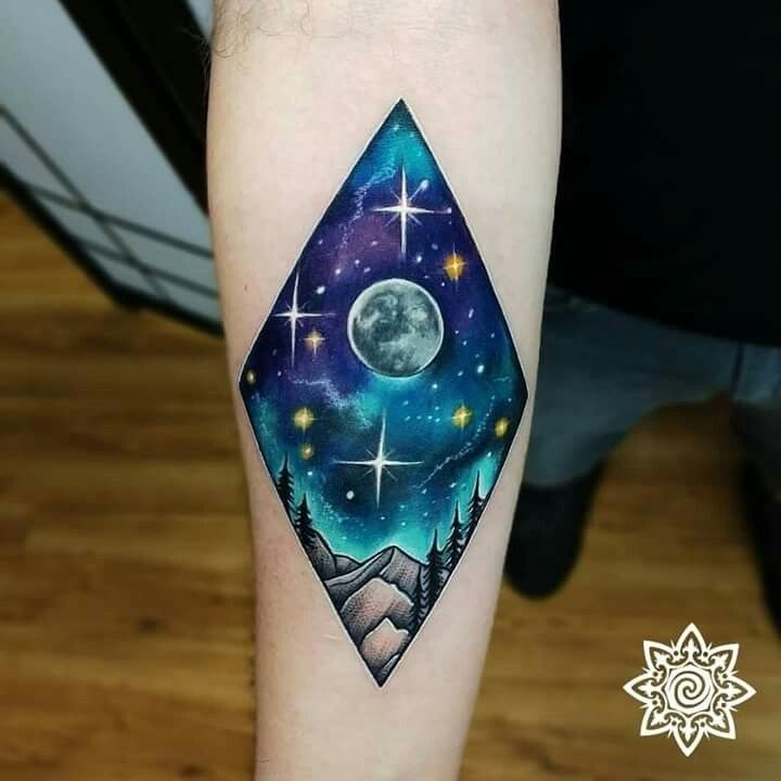 vibrant color moon and forest scene tattoo