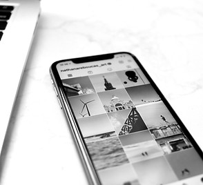 black android smartphone on white table_