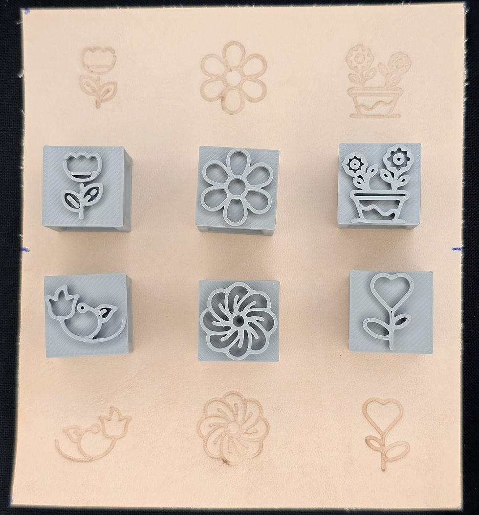 Gray Flowers Leather Stamp Set – Neutral-toned flower stamps on leather background showing imprint results.
