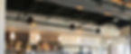 White Bison Coffee transaction space below a custom mezzanine.