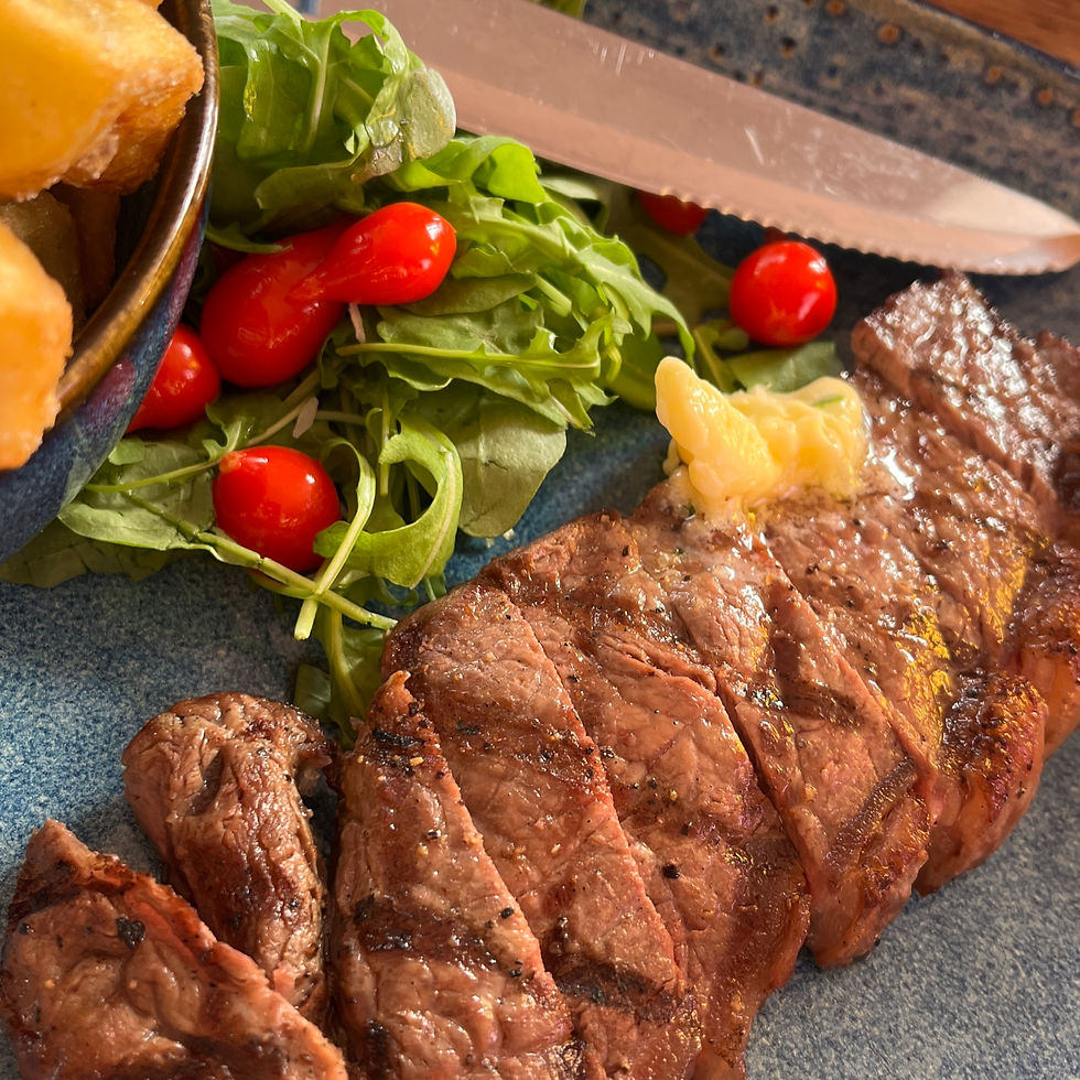 At the Waterfront pub in Plymouth, a plate of steak frites is accompanied by a vibrant salad.