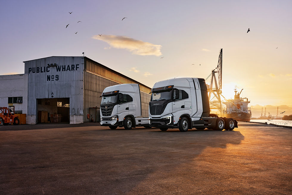 Nikola battery electric and hydrogen trucks at sunset