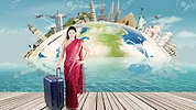 Woman with a suitcase and the world behind her.