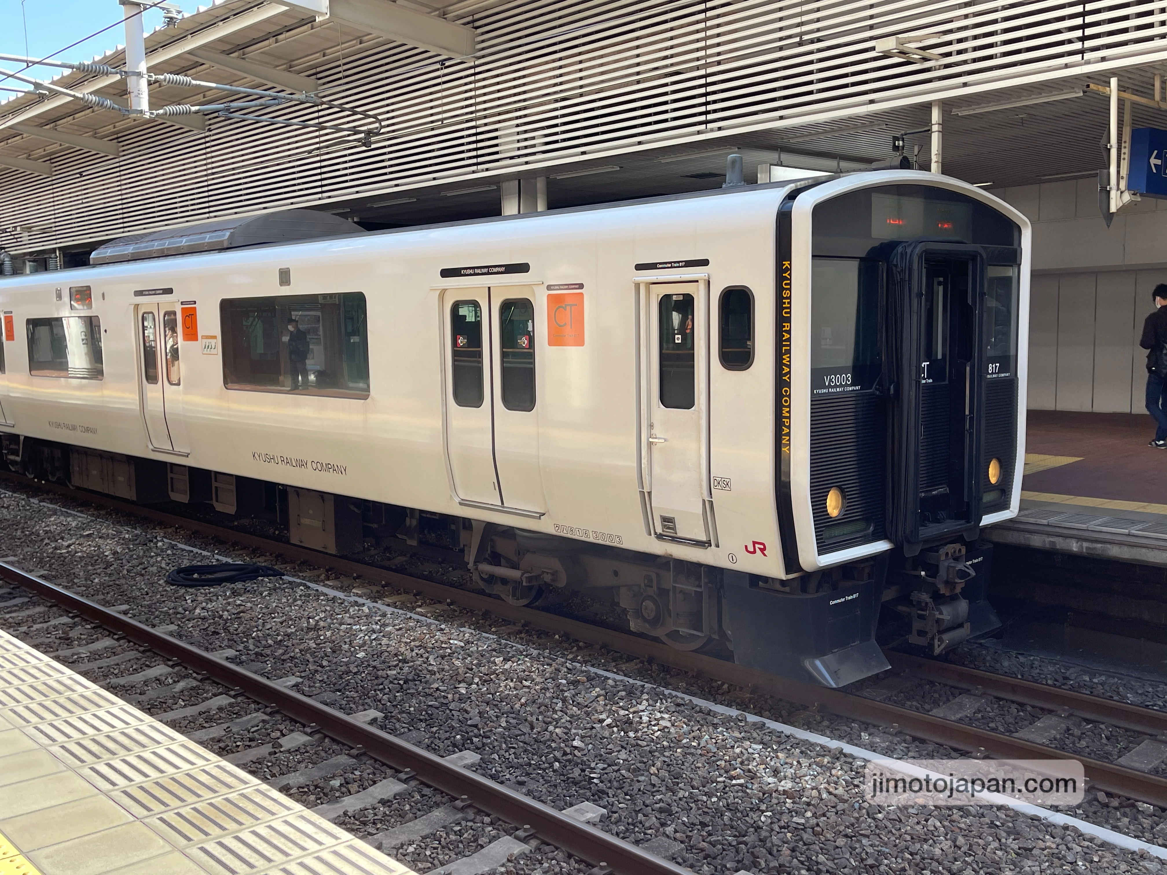 Regional train in Japan at a local station, showing affordable public transportation for everyday travel