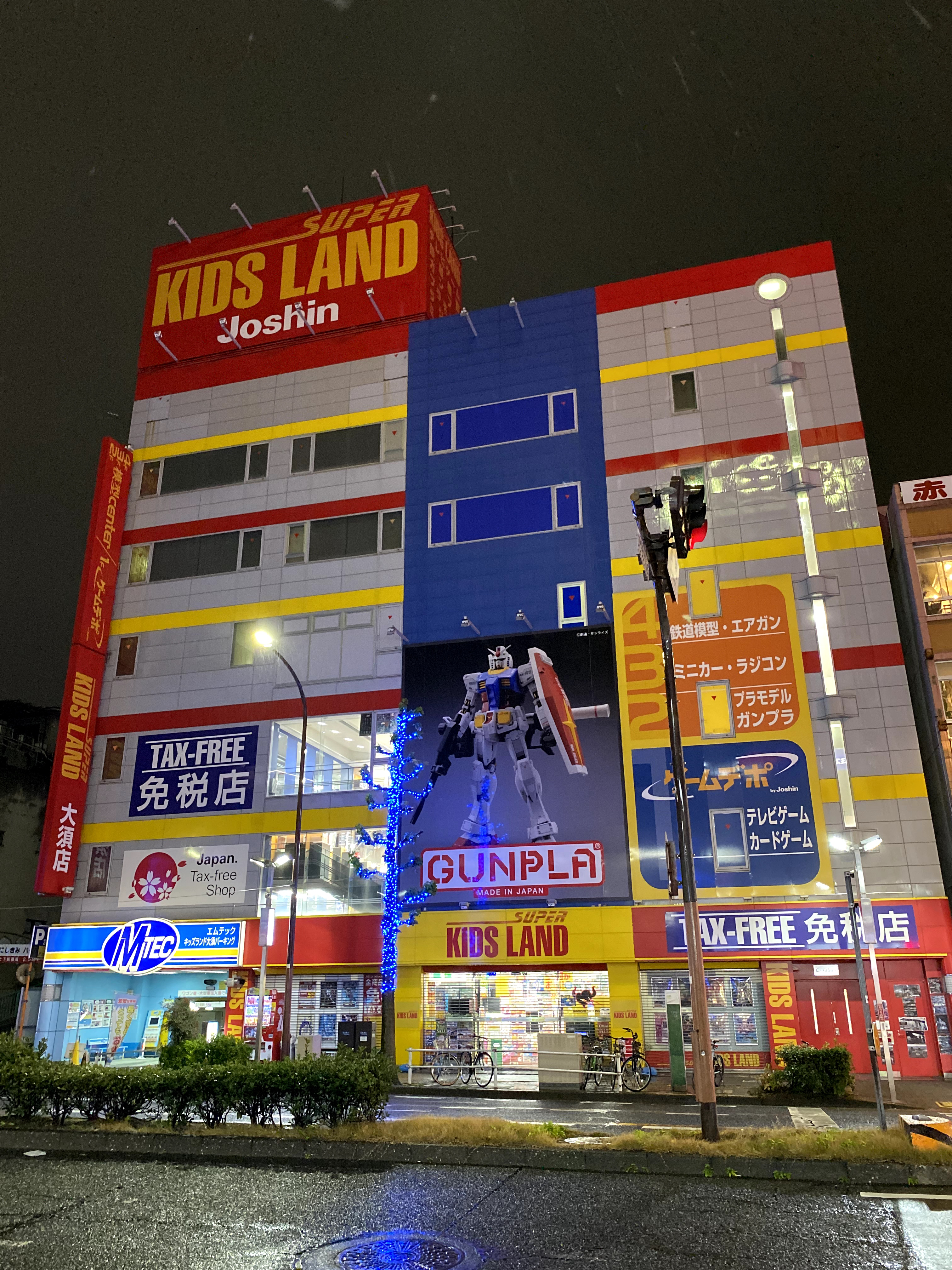 Storefront in Japan displaying tax-free signage, indicating a shop where tourists can shop tax free