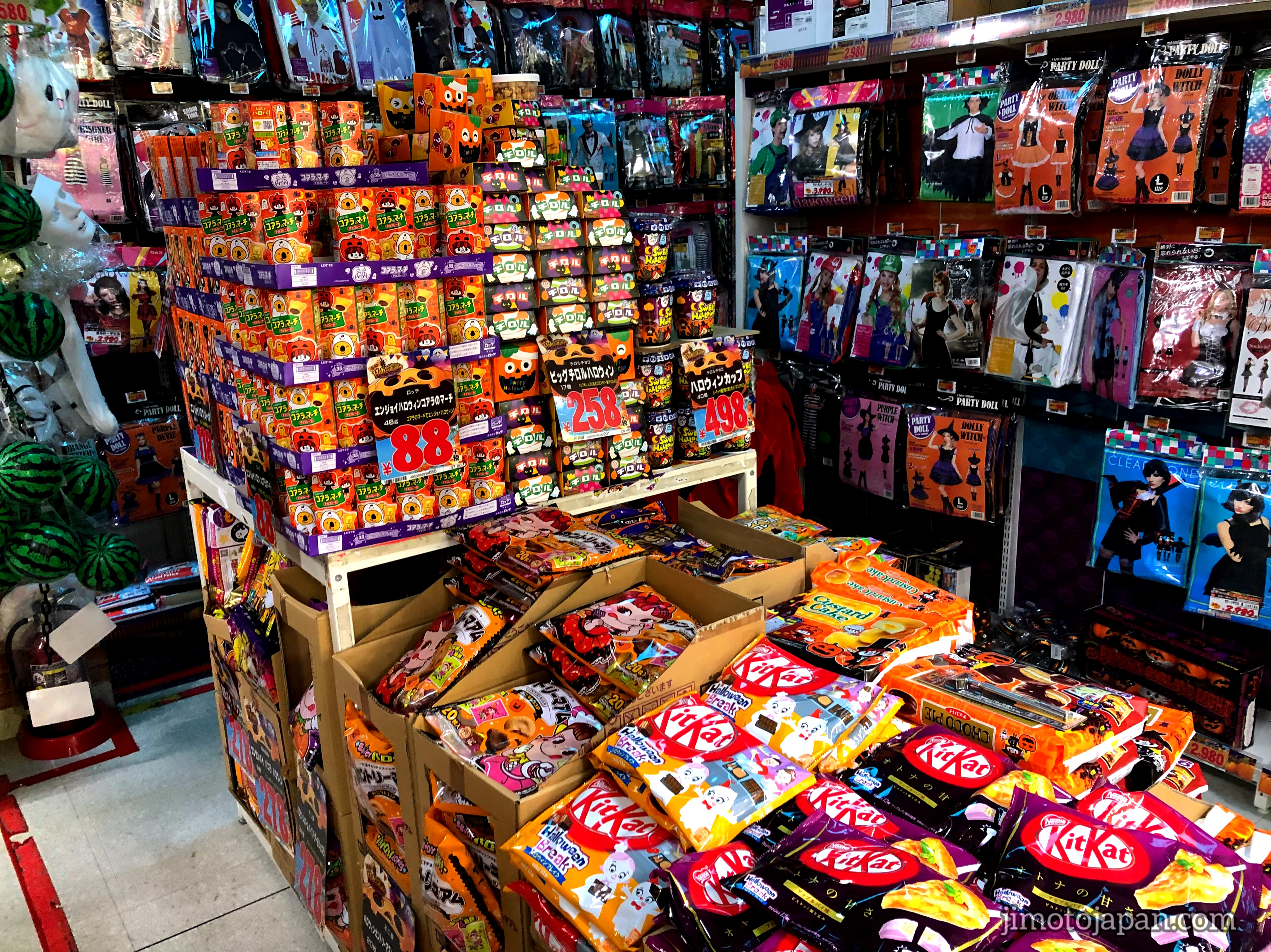 Japanese store display with KitKat chocolates and seasonal snacks, showing popular tax-free souvenir shopping for tourists in Japan
