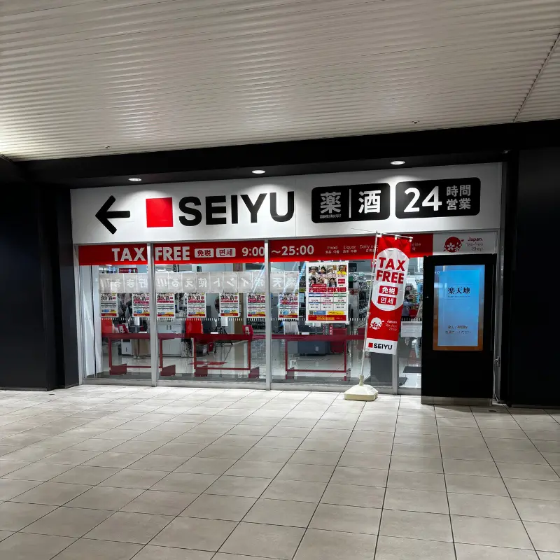 Storefront in Japan displaying tax-free signage, indicating a shop where tourists can shop tax free