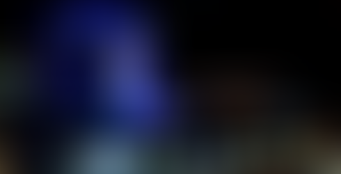 Gundam Factory in Yokohama illuminated at night.