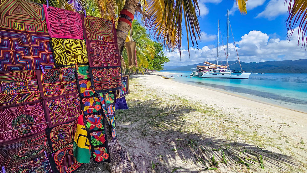 Premium catamarans sailing in the San Blas Islands on a sunny August day with calm turquoise Caribbean waters and perfect summer weather in Guna Yala,