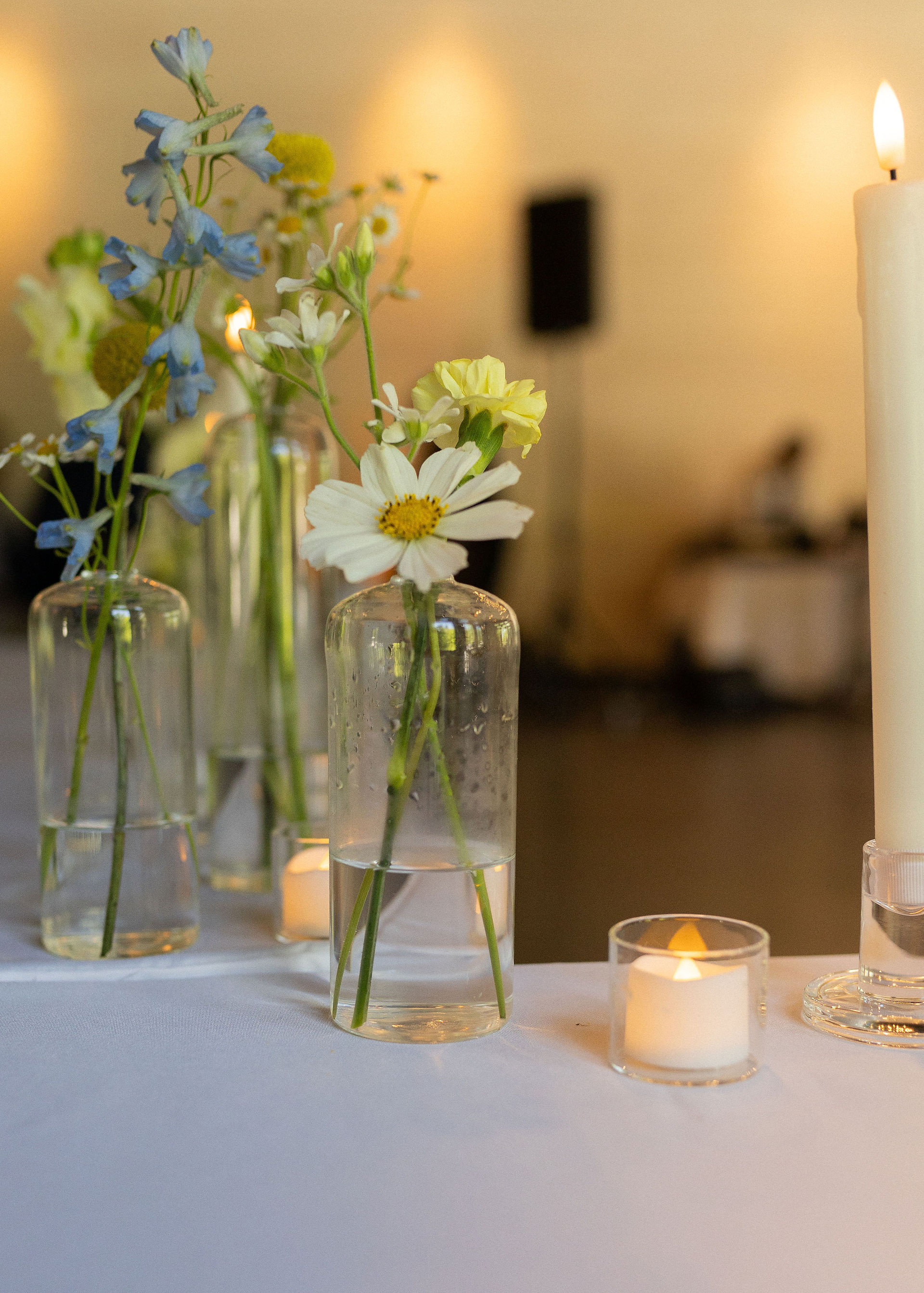 bud vases at wedding venues near me-venues near me with outdoor weddings-yellow wedding colors at wedding venues near me-celestial farms wedding venue in clio, Michigan-wedding venues near me with yellow features-affordable wedding venues near me with yellow wedding