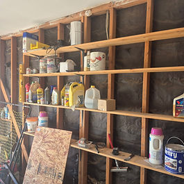 Junk on garage shelves