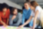 young-coworkers-sharing-concepts-together (1).jpg