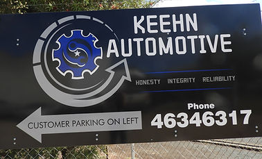 Keehn Automotive sign on front fence of Keehn Automotive's location