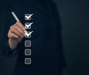 Business performance checklist concept Young business woman using laptop surveys online ch