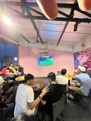 group of friends experiencing summer chill at The Pink Falcon's Cafe 