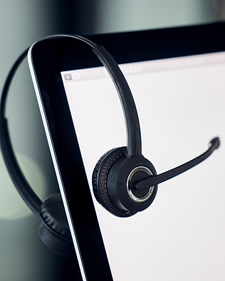 Customer Support Black Headeset over Computer