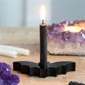 This bat shaped candle holder is perfectly sized for holding a single spell candle whilst it burns during casting.