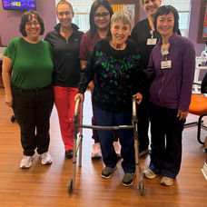 Jackie with her Concept Rehab therapy team
