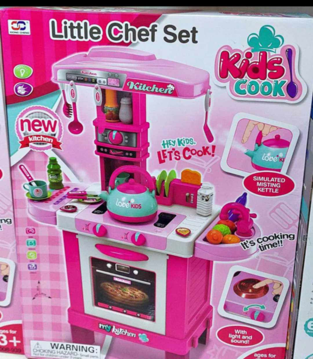 "Explorando el Mundo Culinary: Cocina de Juguete Fucsia con Little Chef Set"