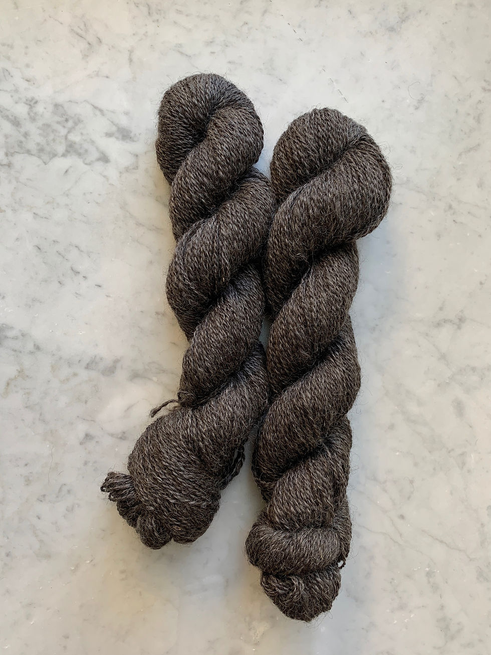Two Skeins of "Capri" - Wensleydale Wool Sport/DK 2ply Yarn Natural Dark Gray Silver